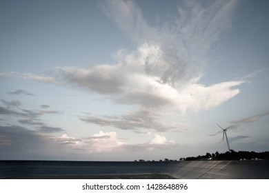 Sky With Wind Turbine For Electricity Generating In The Bright Evening, Abstract Cloud Over Blue Blackgrond, Taken By Wide Angle Lens