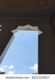 sky from the window of a mosque
