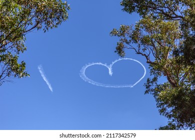 Sky Writing On A Clear Blue Sky Displaying The Letter 