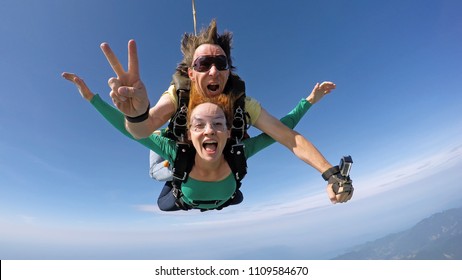 Skydive Tandem Happiness Couple Over The Sea