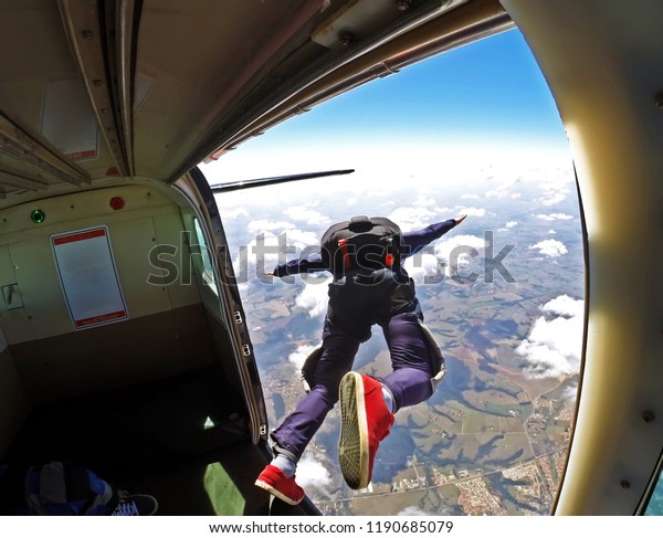 Skydiver jump out of
plane