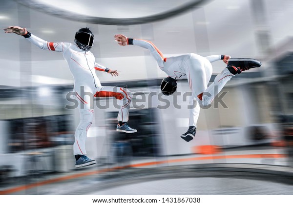 Skydiving. I flying in wind tunnel.Indoor\
skydiving new  sport in flight technology.\
