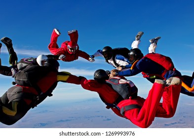 Skydiving teamwork formation make a circle