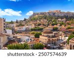 Skyline of Athens with Monastiraki square and Acropolis hill during summer sunny day before sunset. Athens, Greece