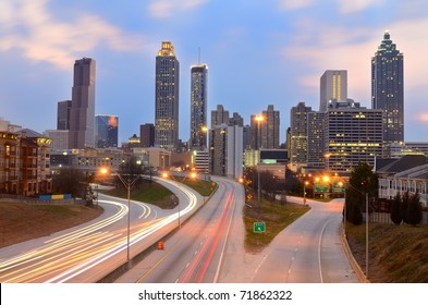 The Skyline Of Atlanta, Georgia Above Freedom Parkway At Night.