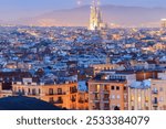 The skyline of Barcelona with the famous Sagrada Familia at night, Spain