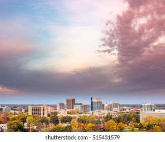 Skyline of Boise Idaho with fall colors and dramatic clouds