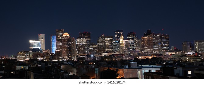 The skyline of Boston in Massachusetts, USA on a clear Winter evening. Golden Hour Sunset concept.
