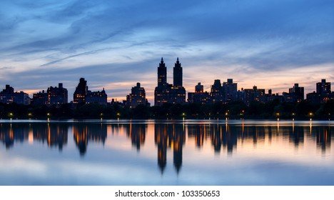 Skyline Of Buildings Along Central Park West Viewed From Above Jackie Kennedy Onassis Reservoir In New York City.