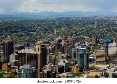 Skyline Calgary from above, at the horizon the rocky mountains