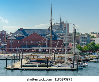Skyline of the city of New London, Connecticut with whaling ship in the foreground.