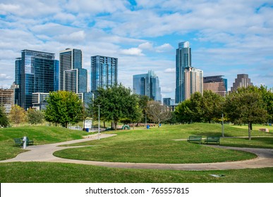 Skyline Cityscape Downtown View With Modern Green Space At Sam Hill Park With Amazing Tall Glass Towers Rising Above The Colorado River And Texas Hill Country City Landscape