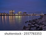 The Skyline of Cologne with Kranhäuser and Colgone Cathedral by night