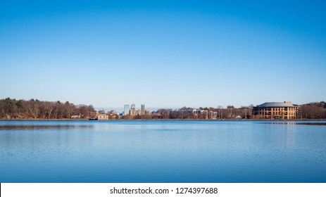 The Skyline Of Downtown Boston As Seen From The Chestnut Hill Water Reservoir.