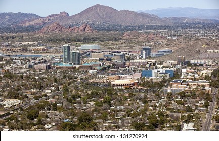 Skyline of downtown Tempe, Arizona with the Papago Buttes and Camelback Mountain in the distance