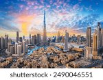 the skyline of Dubai during sunrise

