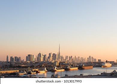 Skyline Of Dubai Financial District At Sunset.