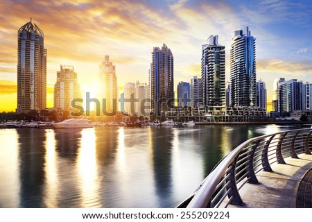 skyline of Dubai Marina at night with boats, United Arab Emirates, Middle East