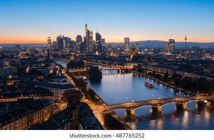 Skyline of Frankfurt am Main city at summer sunset, Germany  - Shutterstock ID 487765252