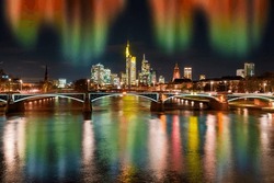 The Skyline Of Frankfurt Am Main In The Evening With Northern Lights And River In The Foreground