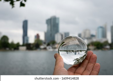 Skyline Of The High Buildings In 22nd District Of Vienna, Austria As Seen From Alte Donau Through Glass Ball