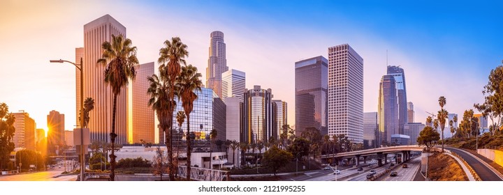 the skyline of los angeles during sunrise - Shutterstock ID 2121995255