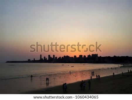 Skyline of Mumbai as visible from Marine Drive, Charni Road, Mumbai (Maharashtra, India) during sunset (summer time)