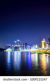 Skyline at night with Haeundae district in Busan, South Korea