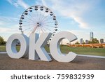 Skyline of Oklahoma City, OK with OKC sign and ferris wheel