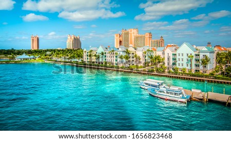 Skyline of Paradise Island with colorful houses at the ferry terminal. Nassau, Bahamas.	