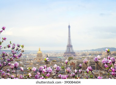 Skyline Of Paris City Roofs With Eiffel Tower At Spring Day With Tree Bloom, France