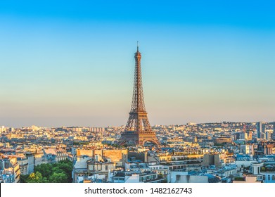 Skyline Of Paris With Eiffel Tower At Dusk