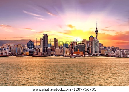 Skyline photo of the biggest city in the New Zealand, Auckland. The photo was taken during the golden sunset across the bay