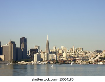 Skyline of San Francisco, in the morning with reflections of the buildings in the Bay
