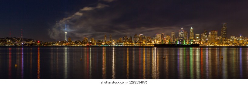 The Skyline Of Seattle - The Most Populous City In The Pacific Northwest - As Seen Just After The Fourth Of July Fireworks Show At Lake Union Was Over As Seen From Seacrest Park