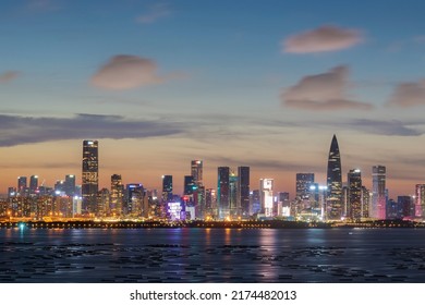 Skyline Of Shenzhen City, China At Sunset. Viewed From Hong Kong Border