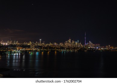 Skyline Of Toronto Over Ontario Lake At The Night Time.