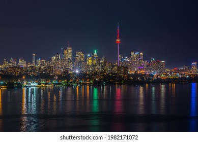 Skyline Of Toronto Over Ontario Lake At The Night Time.