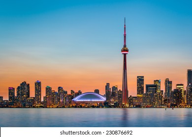 Skyline of Toronto over Ontario Lake at twilight - Powered by Shutterstock