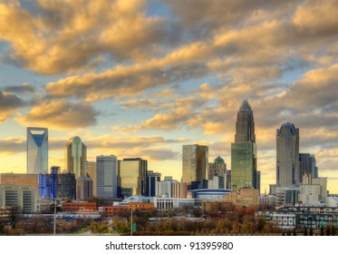 Skyline of Uptown Charlotte, North Carolina under dramatic cloud cover.