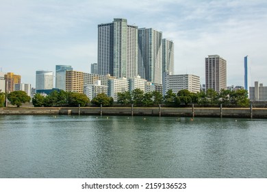 Skyline view of Chuo Ward by Sumida River from the Hamarikyu Gardens in Tokyo, Japan