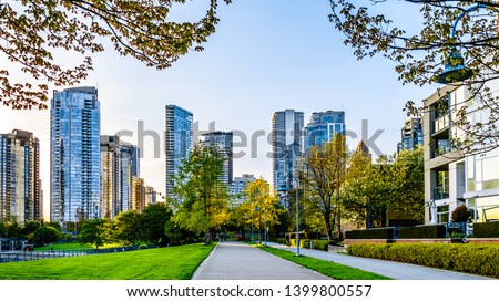 Skyscapers lining the skyline of Yaletown and David Lam Park along False Creek Inlet of Vancouver, British Columbia, Canada