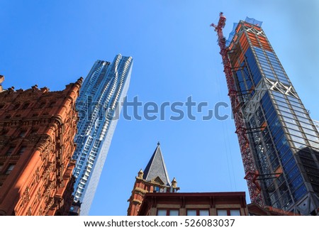 Skyscraper construction on cloudy sky over the Hudson River in Manhattan, New-York, USA