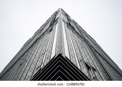 a skyscraper corner looking like a pyramid