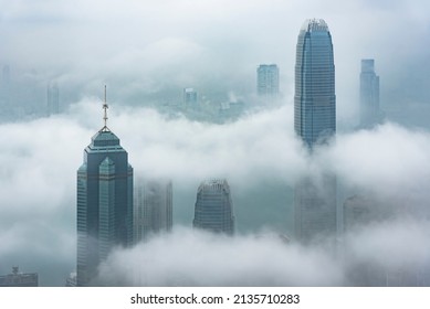 Skyscraper in downtown of Hong Kong city in fog - Powered by Shutterstock