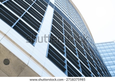 skyscraper facade frame foreshortening from below basic part of building glass external windows and concrete walls background geometric concept urban pattern 