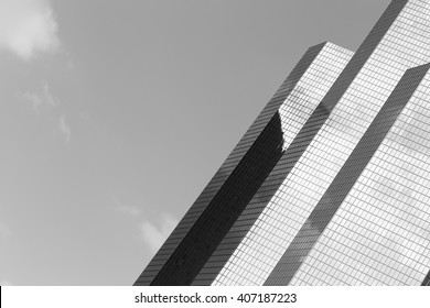 Skyscraper with glass facade. Modern building in Paris. Concepts of economics, financial, business  future. Copy space for text. Black and white.