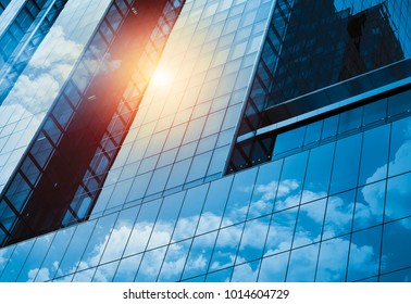 Skyscraper Or Modern Building In The City With Cloud And Sunlight