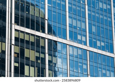 Skyscraper windows close-up. Window frames of demo-scrapers.