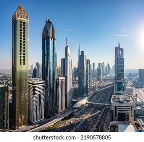 Skyscrapers city highrise business buildings in downtown Dubai, UAE. Futuristic architecture